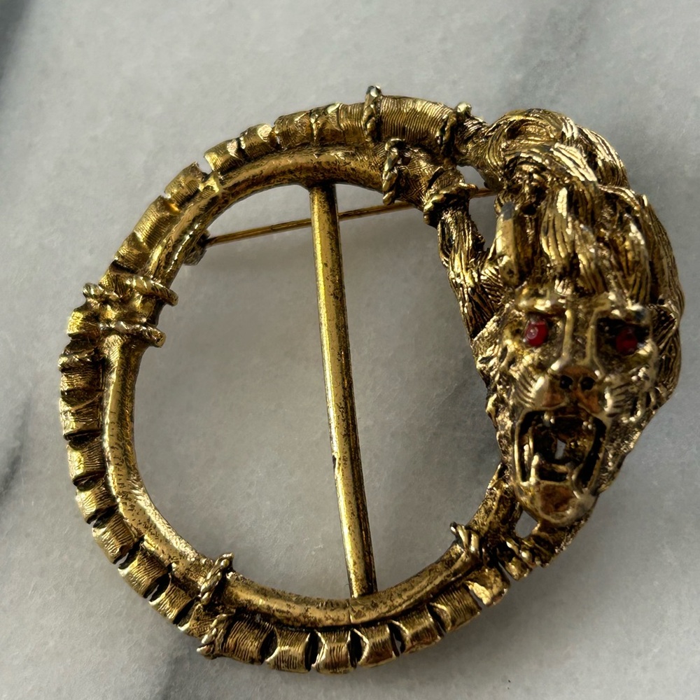Vintage Gold Tone Lion Brooch or buckle with faux ruby eyes